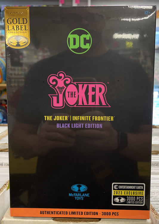 DC McFarlane Toys The Joker Infinite Frontier Black Light Figure SDCC 2023 EE Ex